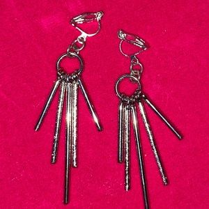 Silver toned dangle clip on earrings